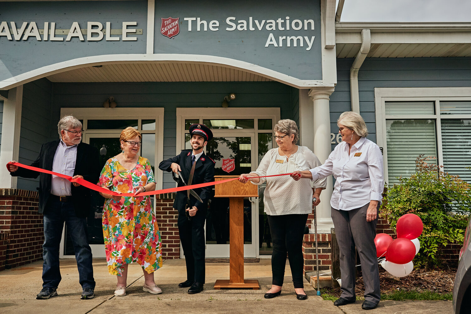 Salvation Army of Chatham County officially cut the ribbon on its new Siler city facility on Thursday. Siler City Mayor Chip Price III, left, Cindy Poindexter of Chatham Chamber of Commerce, Captain Chris Raymer, Jane Wrenn and Rebecca Sommer-Petersen, right, did the honors.